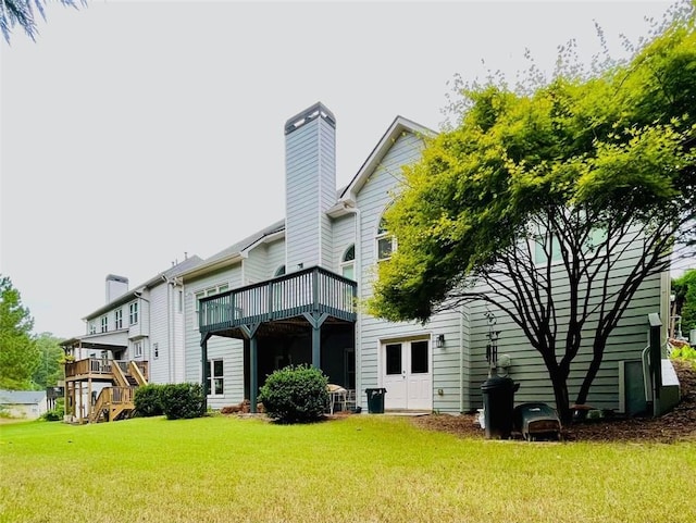306 Mountain Laurel Walk, Canton, GA 30114 - back of property featuring a chimney and a lawn