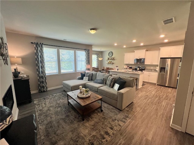 living room with hardwood / wood-style floors