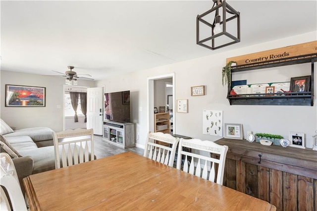 dining area with a ceiling fan