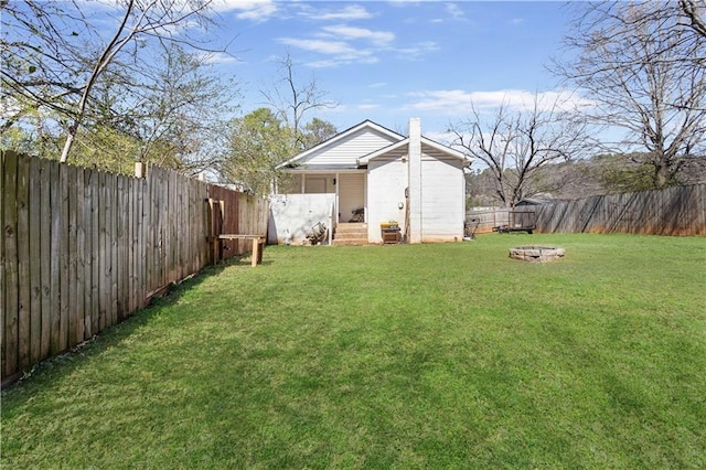 view of yard featuring a fenced backyard