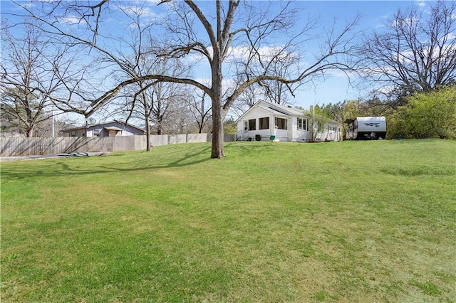 view of yard featuring fence