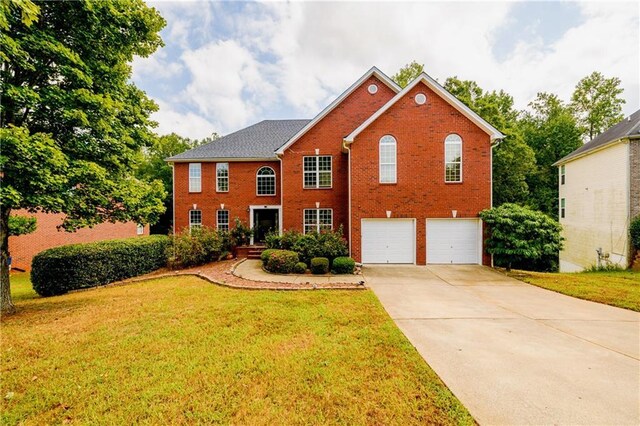 view of property exterior featuring a garage and a lawn