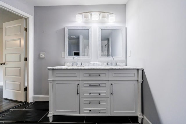 bathroom featuring vanity and hardwood / wood-style floors