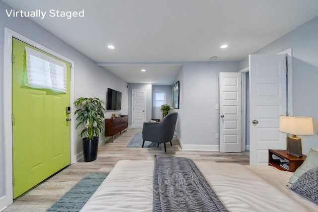 bedroom featuring light wood-type flooring