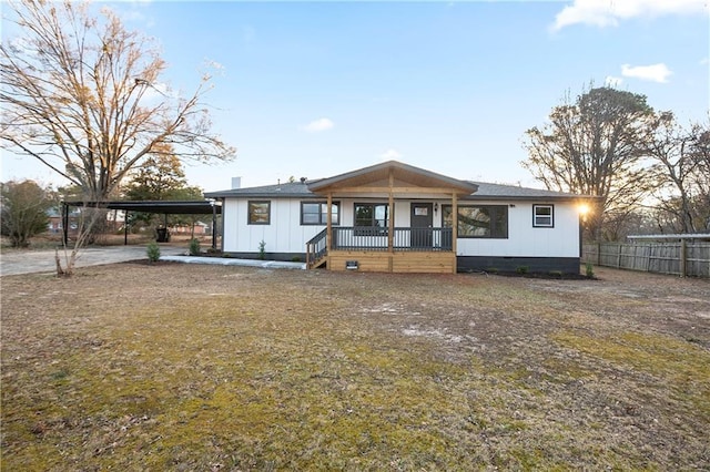 4605 Doss Cir, Powder Springs, GA 30127 - view of front of property with fence, board and batten siding, a porch, crawl space, and driveway