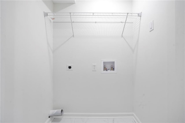 4605 Doss Cir, Powder Springs, GA 30127 - washroom featuring laundry area, electric dryer hookup, baseboards, hookup for a washing machine, and marble finish floor