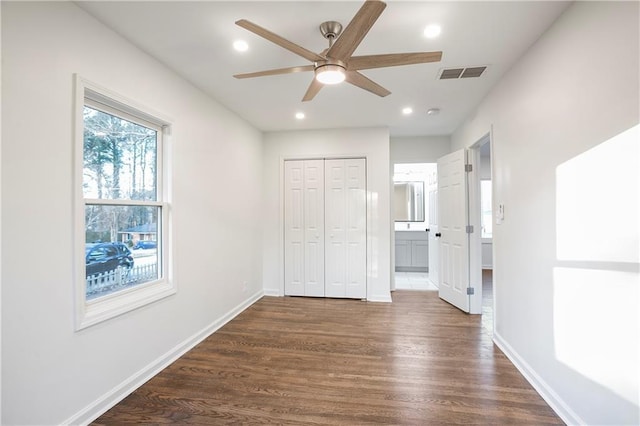 4605 Doss Cir, Powder Springs, GA 30127 - unfurnished bedroom with visible vents, recessed lighting, baseboards, and dark wood-type flooring