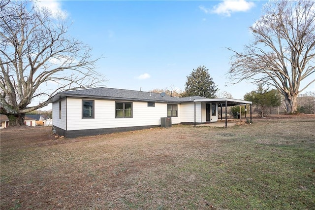 4605 Doss Cir, Powder Springs, GA 30127 - view of front facade featuring a carport, a patio area, and a front lawn