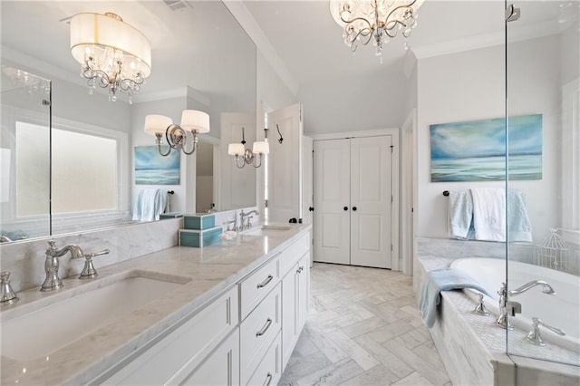 bathroom featuring a tub, a notable chandelier, dual sinks, vanity with extensive cabinet space, and crown molding