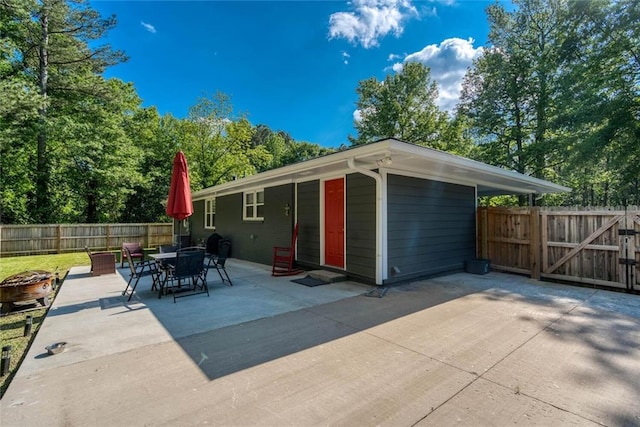 exterior space with a gate and fence