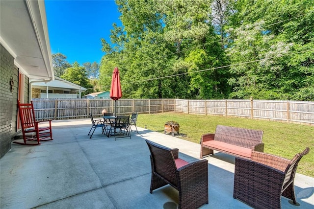 view of patio / terrace with a fenced backyard and outdoor dining space