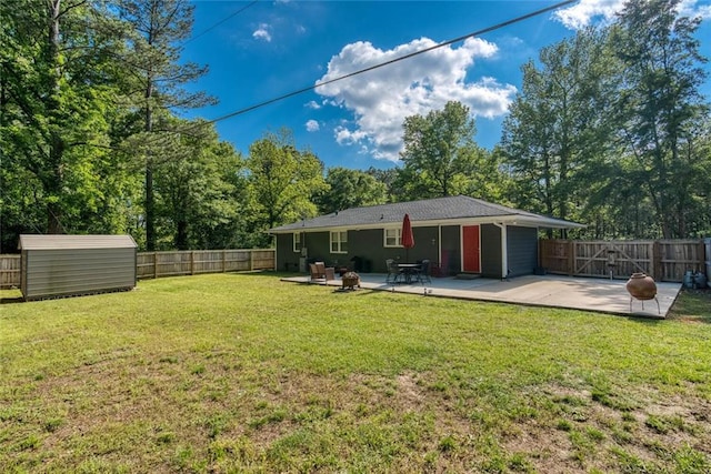 back of house with a patio, a fenced backyard, and a gate