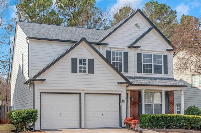 view of front of home with a garage