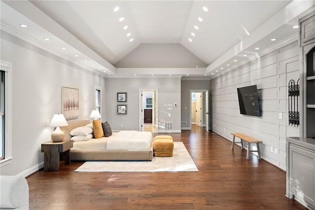 bedroom featuring dark hardwood / wood-style floors, high vaulted ceiling, and a tray ceiling