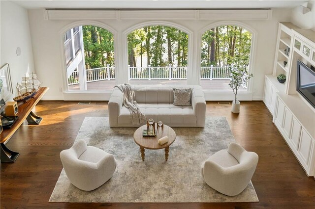 sunroom / solarium featuring a healthy amount of sunlight