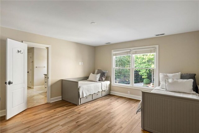 bedroom with wood-type flooring