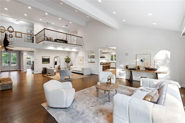 living room with high vaulted ceiling, beamed ceiling, dark wood-type flooring, french doors, and ceiling fan