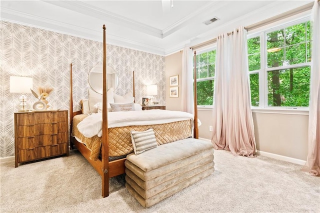 carpeted bedroom with wallpapered walls, baseboards, and ornamental molding
