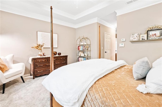 bedroom with ornamental molding and light carpet