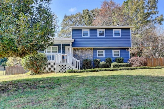 split level home with a front yard