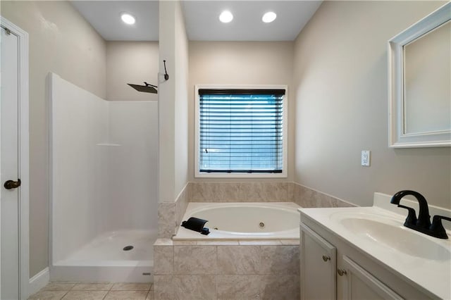 bathroom featuring plus walk in shower and vanity