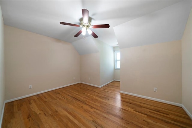 additional living space with light hardwood / wood-style flooring, ceiling fan, and lofted ceiling