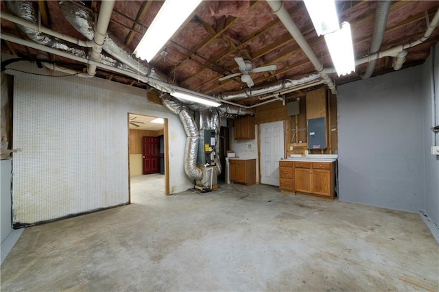 basement with electric panel and heating unit