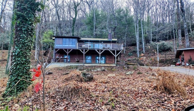 exterior space featuring a wooden deck