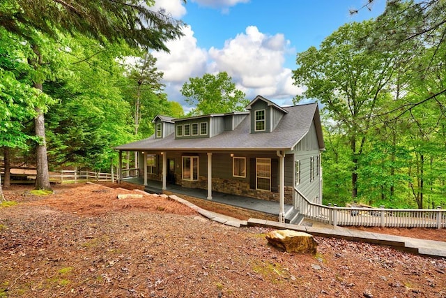 43 Morley Dr, Ellijay, GA 30540 - view of front of property with stone siding, a porch, and roof with shingles