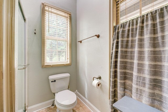 43 Morley Dr, Ellijay, GA 30540 - full bath featuring healthy amount of natural light, toilet, baseboards, and a shower with curtain