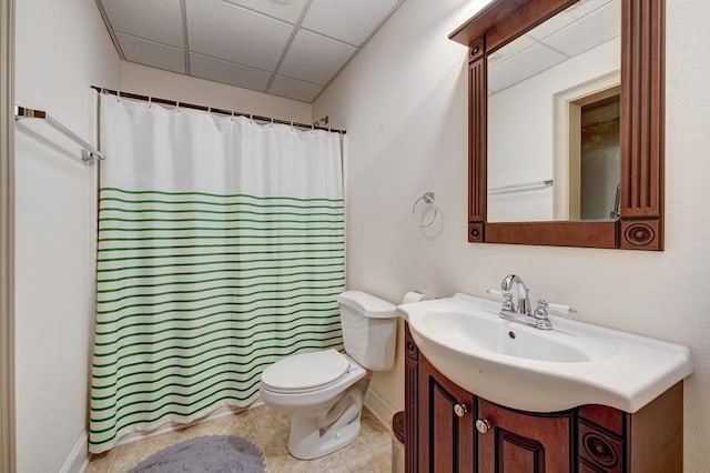 43 Morley Dr, Ellijay, GA 30540 - bathroom with a paneled ceiling, toilet, vanity, baseboards, and tile patterned flooring