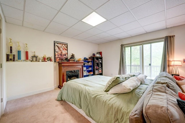 43 Morley Dr, Ellijay, GA 30540 - carpeted bedroom featuring a drop ceiling, access to exterior, a fireplace, and baseboards