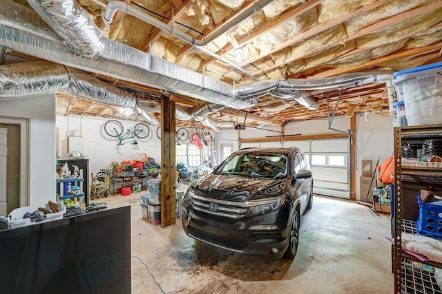 43 Morley Dr, Ellijay, GA 30540 - garage featuring a garage door opener