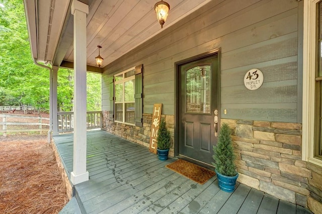 43 Morley Dr, Ellijay, GA 30540 - property entrance featuring a porch and stone siding