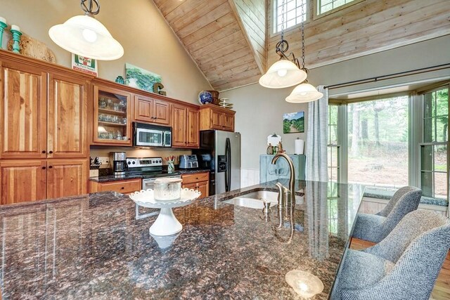 43 Morley Dr, Ellijay, GA 30540 - kitchen with appliances with stainless steel finishes, high vaulted ceiling, brown cabinets, a sink, and wood ceiling
