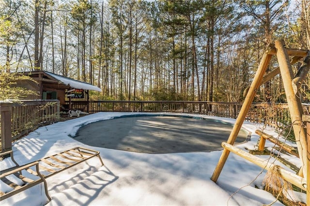 view of snow covered pool