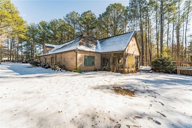 view of snow covered property