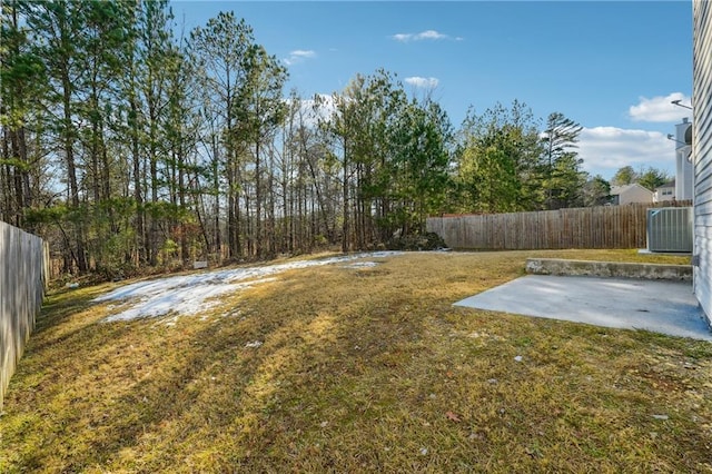 view of yard with a patio area and central AC