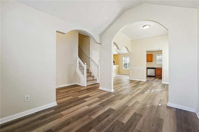 interior space featuring lofted ceiling and wood-type flooring