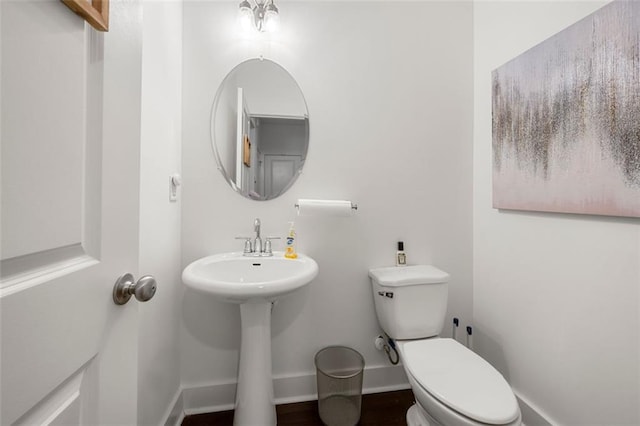 bathroom with toilet and sink