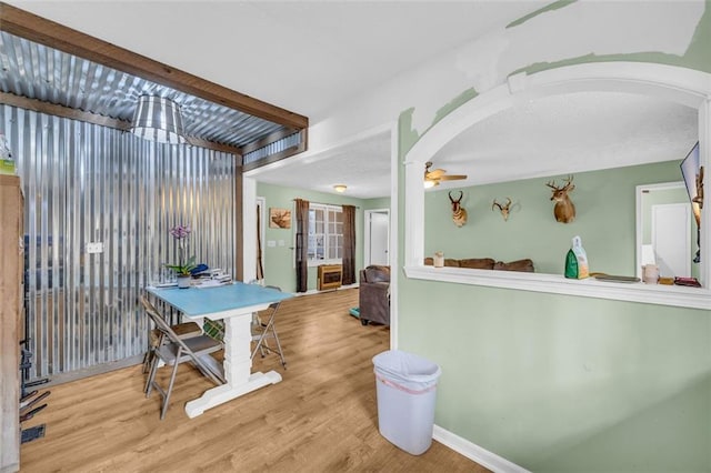 interior space with light hardwood / wood-style floors and ceiling fan