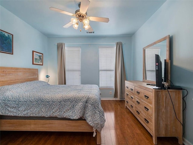 bedroom featuring hardwood / wood-style flooring and ceiling fan