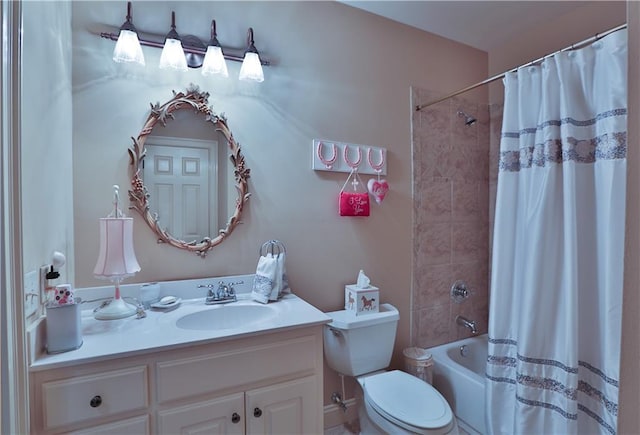 full bathroom with toilet, vanity, and shower / bath combo with shower curtain