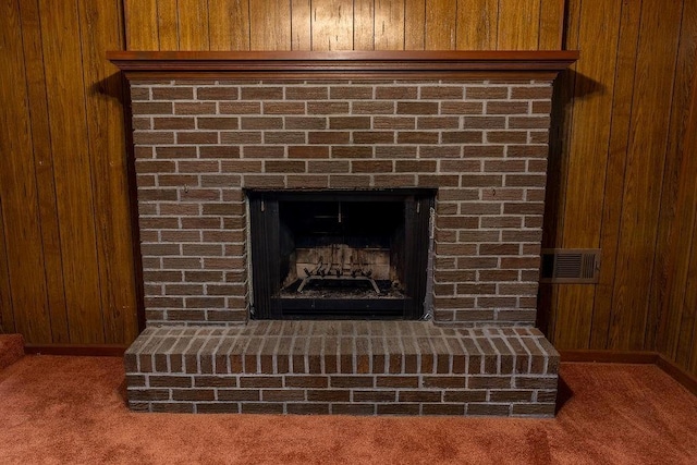 4370 Tradition Ter, Austell, GA 30106 - detailed view of wooden walls, carpet flooring, and a brick fireplace