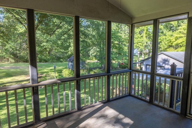 4370 Tradition Ter, Austell, GA 30106 - unfurnished sunroom featuring vaulted ceiling and plenty of natural light
