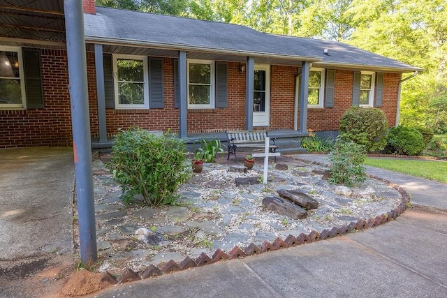4370 Tradition Ter, Austell, GA 30106 - single story home featuring covered porch, brick siding, and a chimney