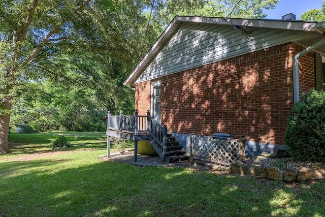 4370 Tradition Ter, Austell, GA 30106 - view of home's exterior featuring a lawn, brick siding, and a deck