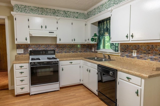 4370 Tradition Ter, Austell, GA 30106 - kitchen with range with gas stovetop, dishwasher, a sink, under cabinet range hood, and ornamental molding
