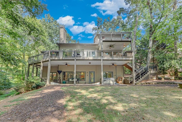 6144 Scott Dr, Flowery Branch, GA 30542 - rear view of property with a ceiling fan, a jacuzzi, stairway, a wooden deck, and a yard