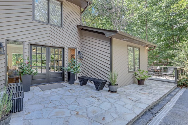 6144 Scott Dr, Flowery Branch, GA 30542 - doorway to property with a patio area
